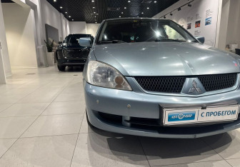 Подержанный автомобиль Mitsubishi Lancer Wagon 2006 года (9 фото)