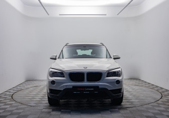 Подержанный автомобиль BMW X1 2013 года (2 фото)