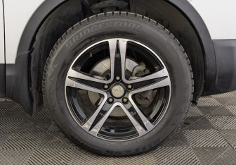 Подержанный автомобиль Nissan Qashqai 2013 года (12 фото)