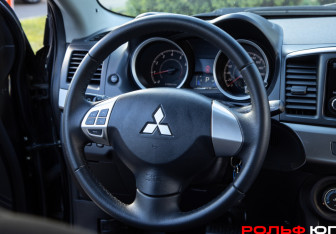 Подержанный автомобиль Mitsubishi Lancer Sedan 2014 года (10 фото)