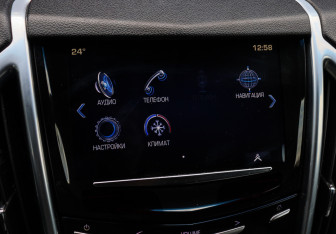 Подержанный автомобиль Cadillac SRX 2014 года (20 фото)