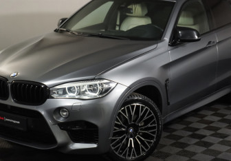 Подержанный автомобиль BMW X6 2016 года (25 фото)