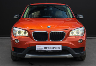 Подержанный автомобиль BMW X1 2013 года (2 фото)