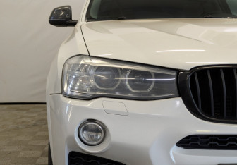 Подержанный автомобиль BMW X4 2015 года (16 фото)