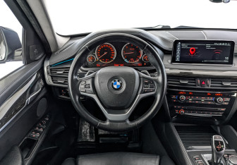 Подержанный автомобиль BMW X6 2016 года (21 фото)