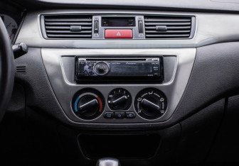 Подержанный автомобиль Mitsubishi Lancer Sedan 2009 года (14 фото)