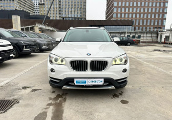 Подержанный автомобиль BMW X1 2012 года (2 фото)
