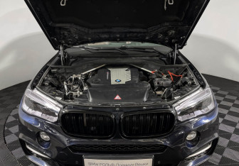 Подержанный автомобиль BMW X6 2016 года (10 фото)