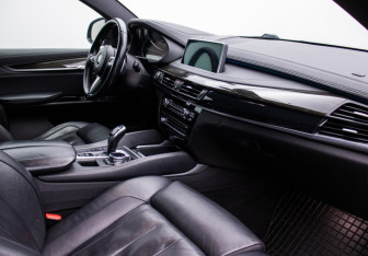 Подержанный автомобиль BMW X6 2014 года (9 фото)