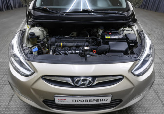 Подержанный автомобиль Hyundai Solaris Hatchback 2013 года (9 фото)