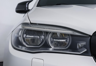 Подержанный автомобиль BMW X6 2016 года (23 фото)