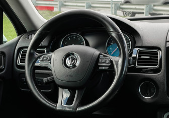 Подержанный автомобиль Volkswagen Touareg 2014 года (13 фото)