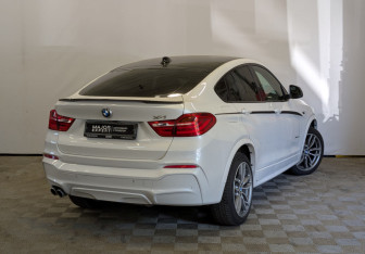 Подержанный автомобиль BMW X4 2015 года (5 фото)
