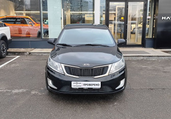 Подержанный автомобиль Kia Rio Hatchback 2014 года (2 фото)