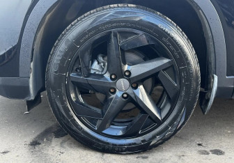 Подержанный автомобиль Omoda C5 2023 года (14 фото)