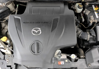 Подержанный автомобиль Mazda CX-7 2010 года (10 фото)