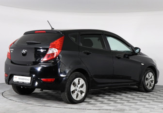 Подержанный автомобиль Hyundai Solaris Hatchback 2013 года (3 фото)