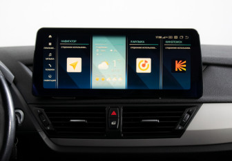 Подержанный автомобиль BMW X1 2014 года (14 фото)