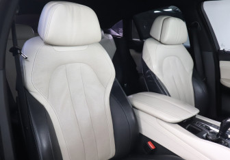 Подержанный автомобиль BMW X6 2015 года (16 фото)