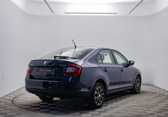 Подержанный автомобиль Skoda Rapid Liftback 2014 года (5 фото)