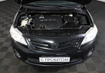 Подержанный автомобиль Toyota Corolla Sedan 2012 года (9 фото)