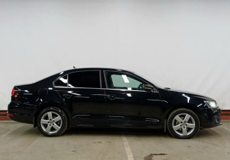 Подержанный автомобиль Volkswagen Jetta Sedan 2014 года (4 фото)