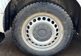 Подержанный автомобиль Volkswagen Transporter Minivan 2013 года (14 фото)