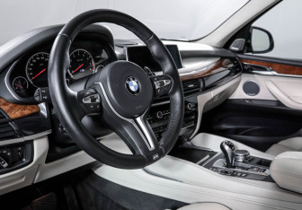 Подержанный автомобиль BMW X5 M 2015 года (14 фото)