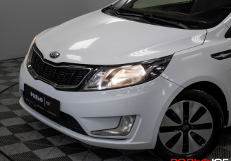 Подержанный автомобиль Kia Rio Sedan 2013 года (16 фото)