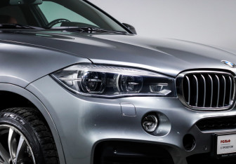 Подержанный автомобиль BMW X6 2016 года (17 фото)