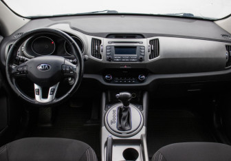 Подержанный автомобиль Kia Sportage 2014 года (13 фото)