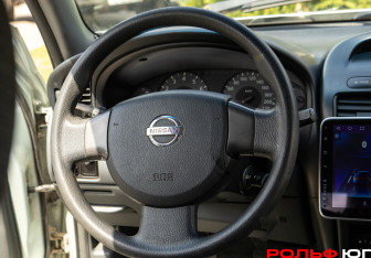 Подержанный автомобиль Nissan Almera Classic 2006 года (11 фото)