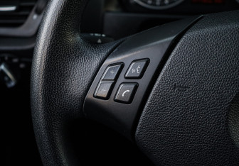 Подержанный автомобиль BMW X1 2014 года (21 фото)