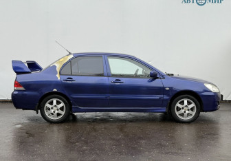 Подержанный автомобиль Mitsubishi Lancer Sedan 2003 года (4 фото)
