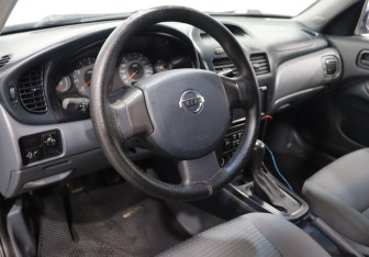 Подержанный автомобиль Nissan Almera Classic 2007 года (10 фото)