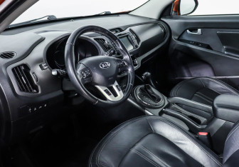 Подержанный автомобиль Kia Sportage 2013 года (9 фото)