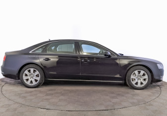 Подержанный автомобиль Audi A8 2013 года (4 фото)