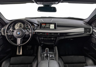 Подержанный автомобиль BMW X6 2018 года (14 фото)