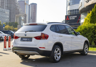 Подержанный автомобиль BMW X1 2014 года (5 фото)