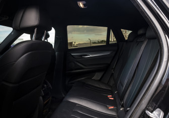 Подержанный автомобиль BMW X6 2018 года (15 фото)