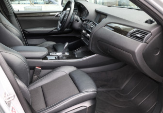 Подержанный автомобиль BMW X4 2016 года (11 фото)