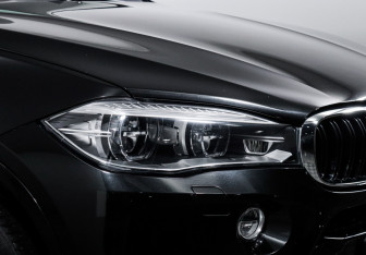 Подержанный автомобиль BMW X6 M 2015 года (16 фото)
