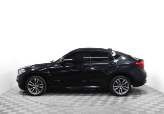Подержанный автомобиль BMW X6 2015 года (8 фото)