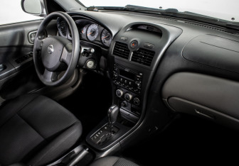 Подержанный автомобиль Nissan Almera Classic 2012 года (10 фото)