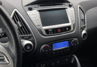 Подержанный автомобиль Hyundai ix35 2012 года (13 фото)