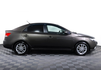 Подержанный автомобиль Kia Cerato Sedan 2011 года (4 фото)