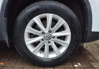 Подержанный автомобиль Volkswagen Tiguan 2014 года (13 фото)