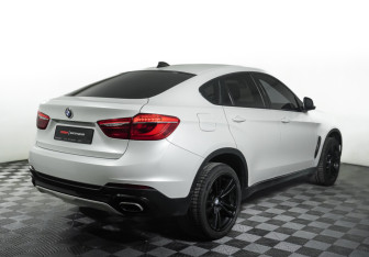 Подержанный автомобиль BMW X6 2015 года (5 фото)