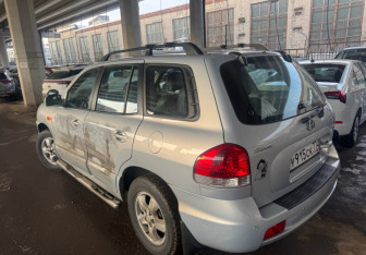 Подержанный автомобиль Hyundai Santa Fe 2011 года (6 фото)