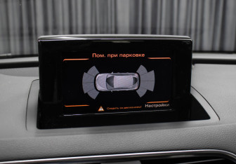 Подержанный автомобиль Audi Q3 2013 года (19 фото)